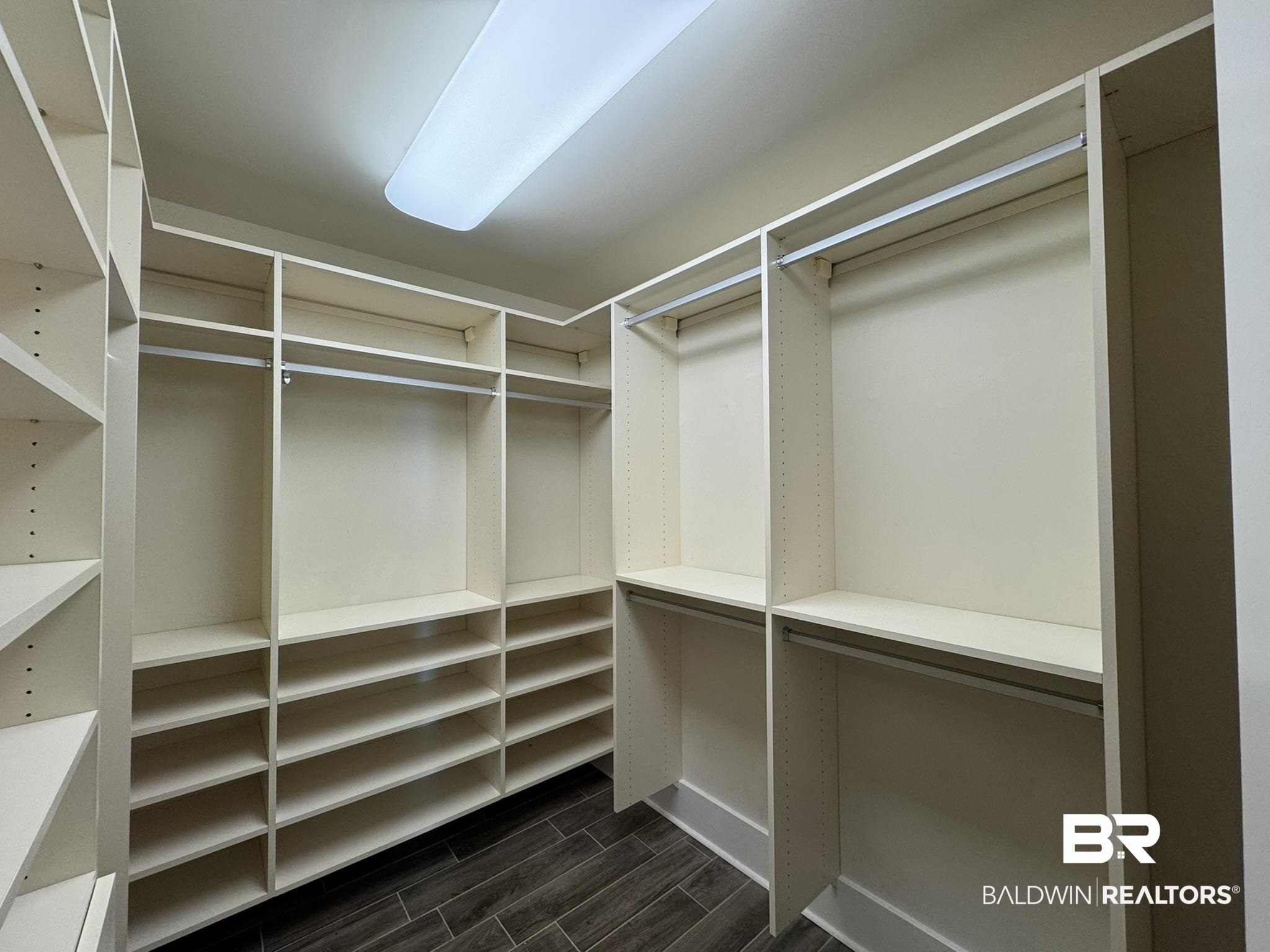 28107 Perdido Beach Boulevard, Unit D714 Orange Beach, AL 36561 - Photo 33 of 88 Spacious closet featuring wood tiled floor
