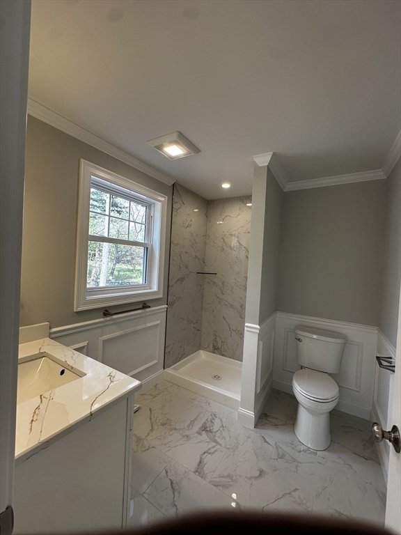56 Dudley Road Billerica, MA 01821 - Photo 11 of 29 a bathroom with a granite countertop sink a toilet and shower