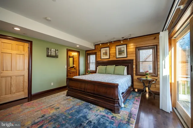 a bathroom with a toilet a sink and shower