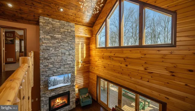 a en suite bathroom with a granite countertop sink and a mirror