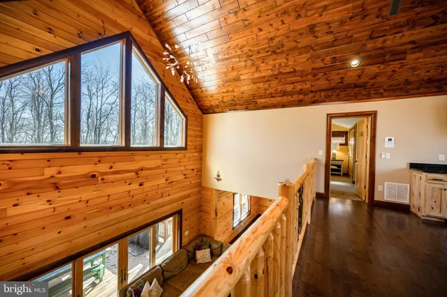 a bed room with a bed and a lamp