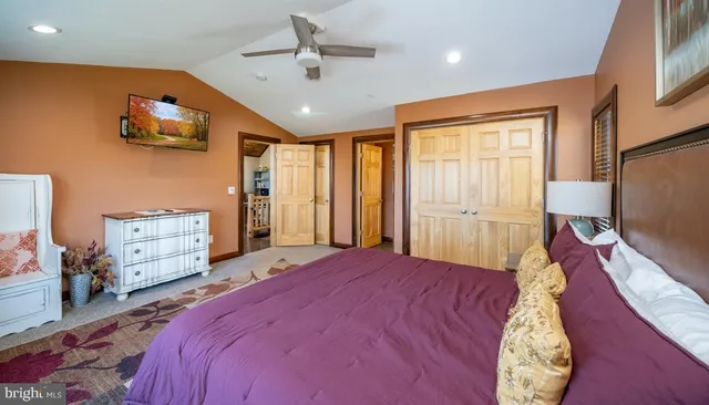a front view of a house with a yard table and chairs