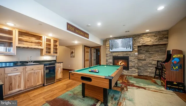 a view of a lush green hillside and houses