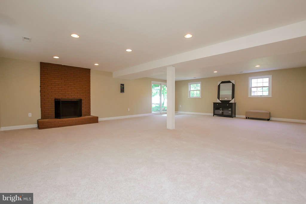 4514 Rhett Lane Fairfax, VA 22030 - Photo 20 of 29 Rec room with fireplace