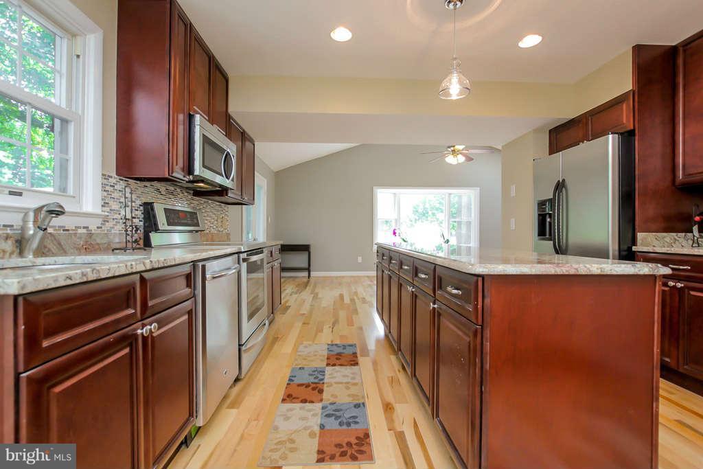 4514 Rhett Lane Fairfax, VA 22030 - Photo 7 of 29 Kitchen view from stairwell to family room