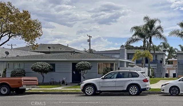 a car parked in front of a house