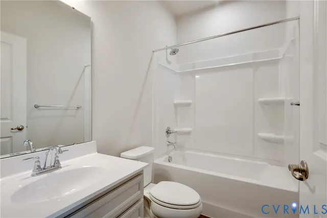 a bathroom with a sink a toilet and a bathtub