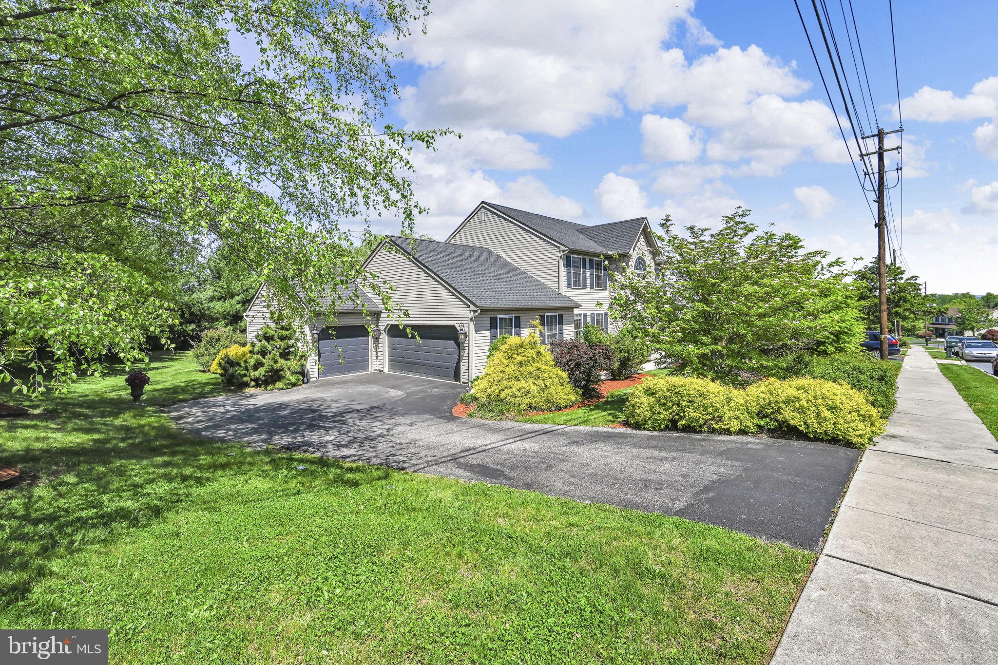 510 Martins Road Reading, PA 19608 - Photo 6 of 52 Charming home with lush greenery.