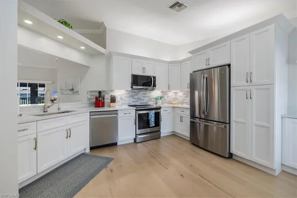 $2,900 | 13040 Castle Harbour Drive, Unit T1, Naples, FL 34110