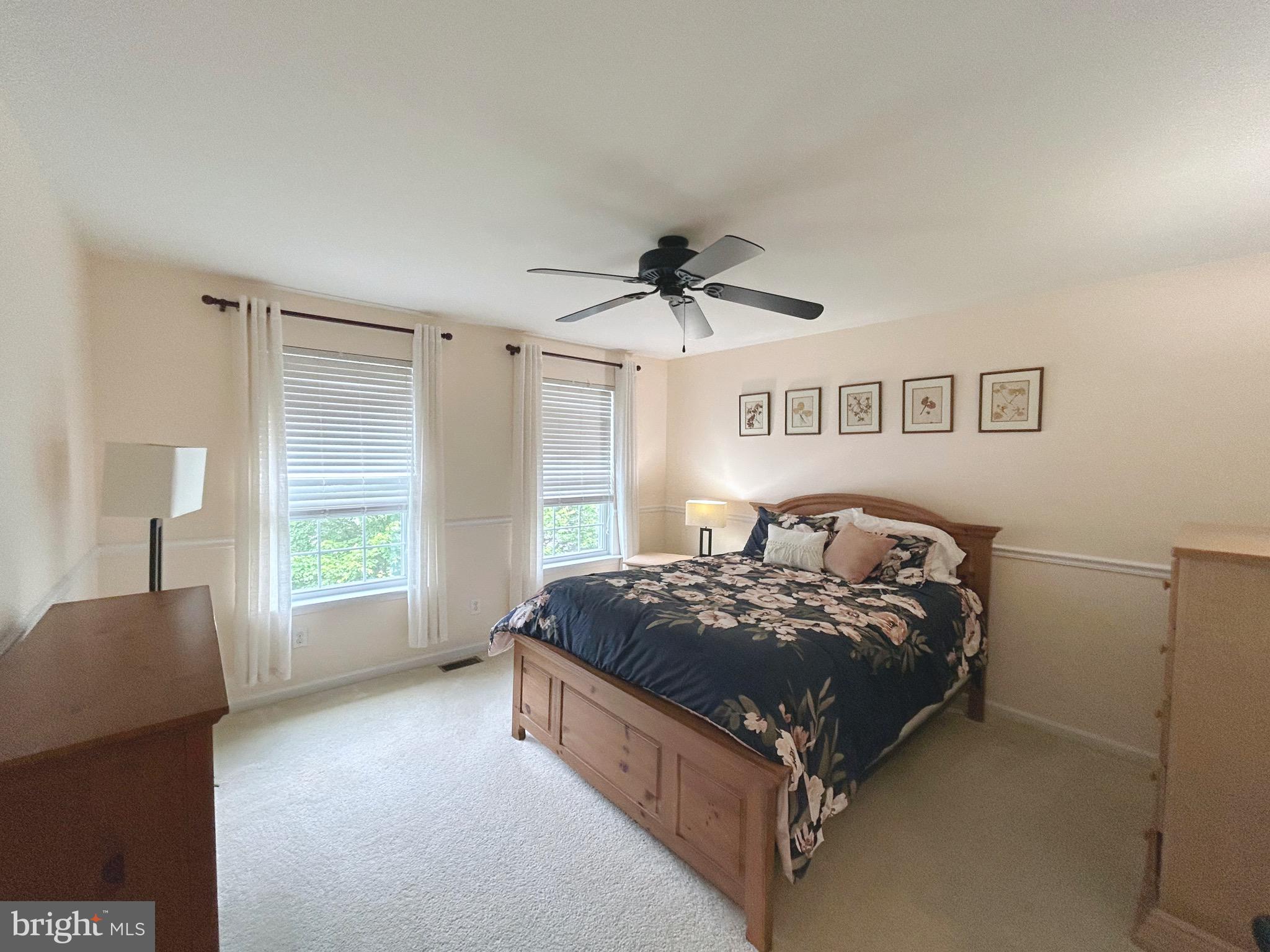 25 Baldwin Circle Glenmoore, PA 19343 - Photo 16 of 33 a bed sitting in a spacious bedroom next to a window