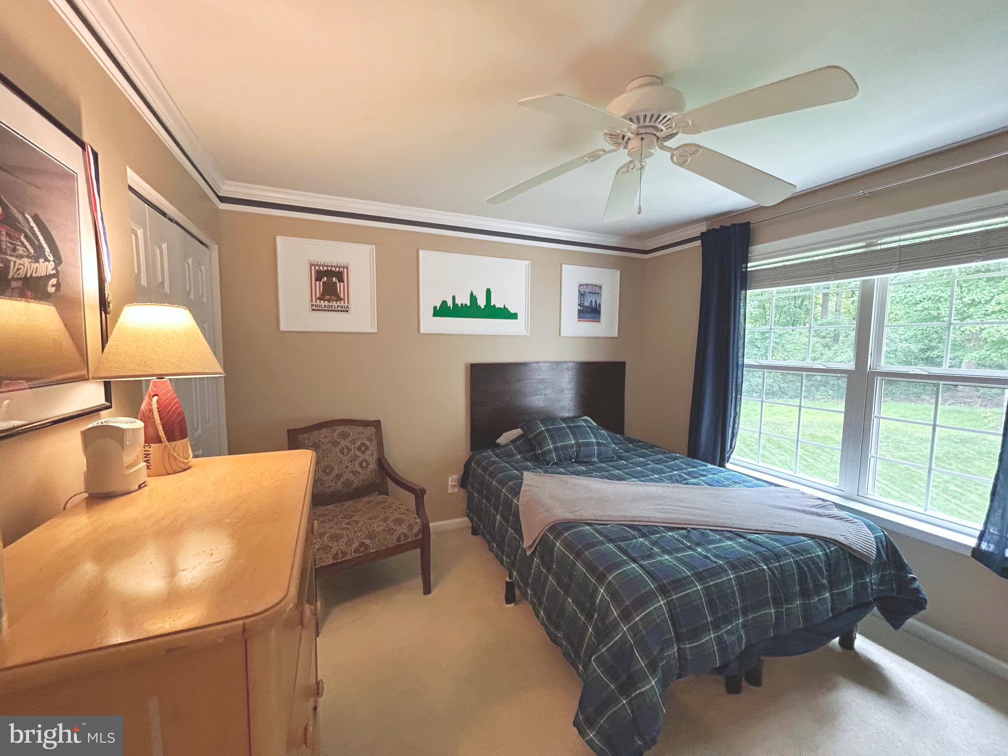 25 Baldwin Circle Glenmoore, PA 19343 - Photo 17 of 33 a bedroom with a bed and window