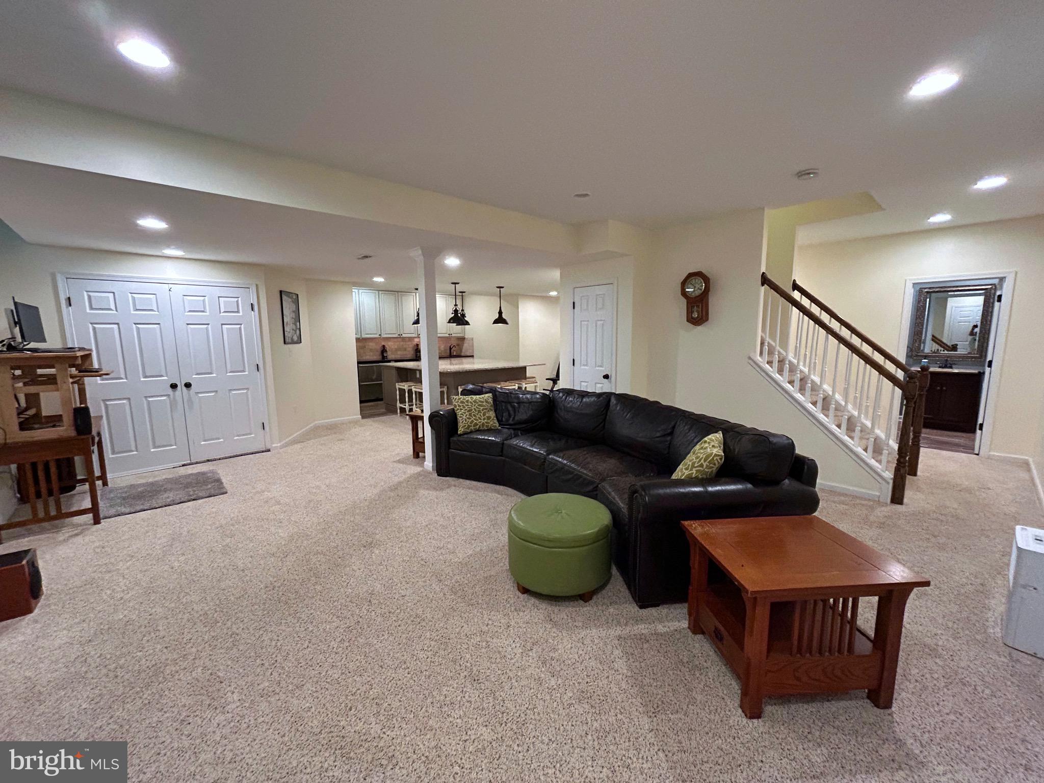 25 Baldwin Circle Glenmoore, PA 19343 - Photo 20 of 33 a living room with furniture and a flat screen tv