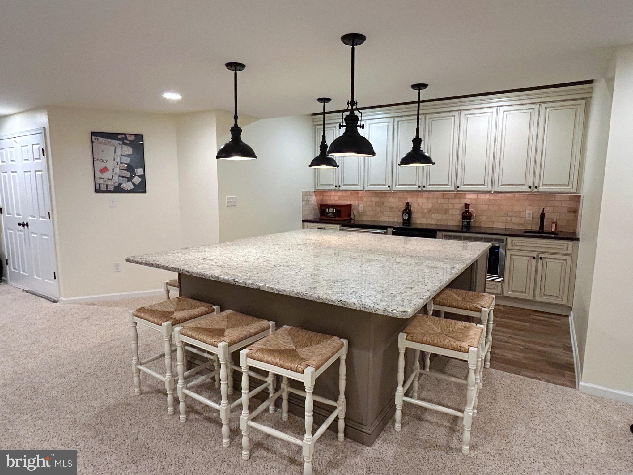 25 Baldwin Circle Glenmoore, PA 19343 - Photo 22 of 33 a kitchen with a table and chairs in it
