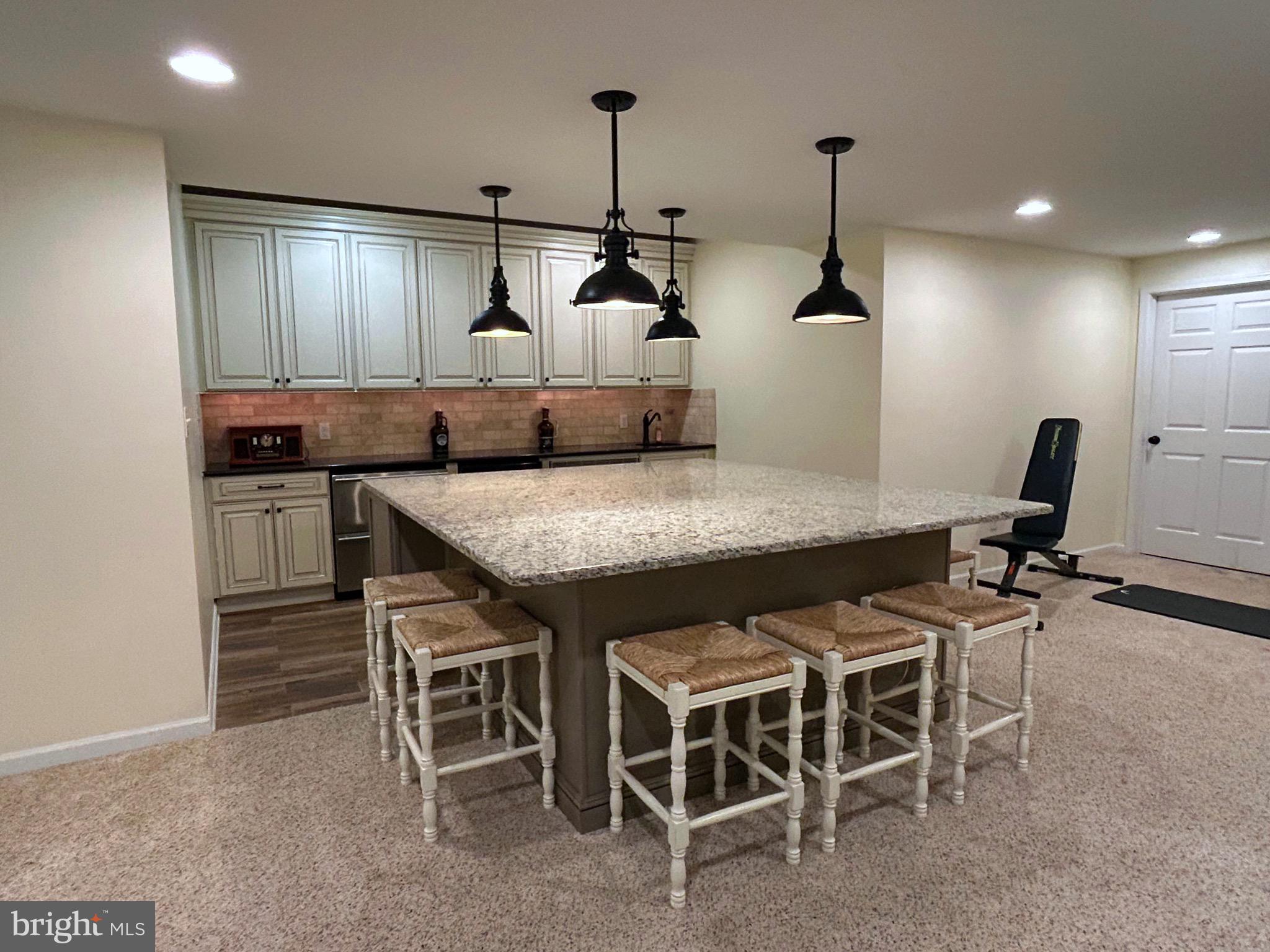 25 Baldwin Circle Glenmoore, PA 19343 - Photo 23 of 33 a kitchen with a table and chairs in it