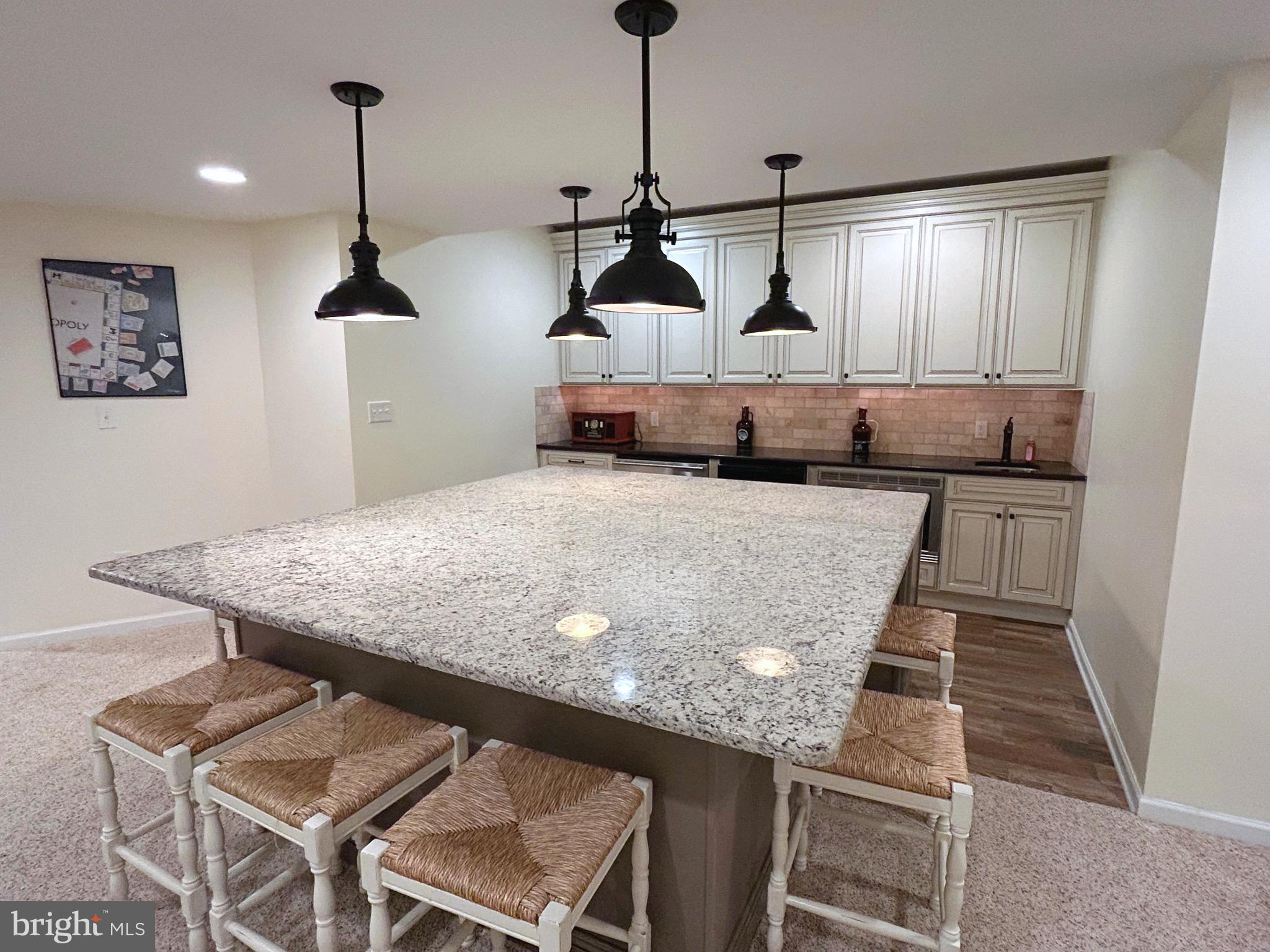 25 Baldwin Circle Glenmoore, PA 19343 - Photo 24 of 33 a kitchen with stainless steel appliances granite countertop counter space a sink and cabinets