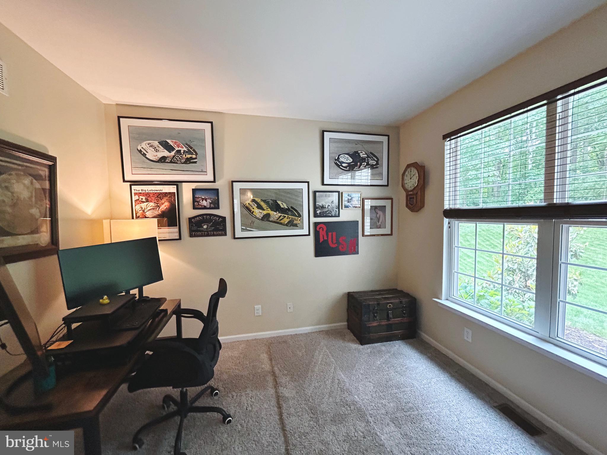 25 Baldwin Circle Glenmoore, PA 19343 - Photo 5 of 33 a workspace with lounge chair and a window