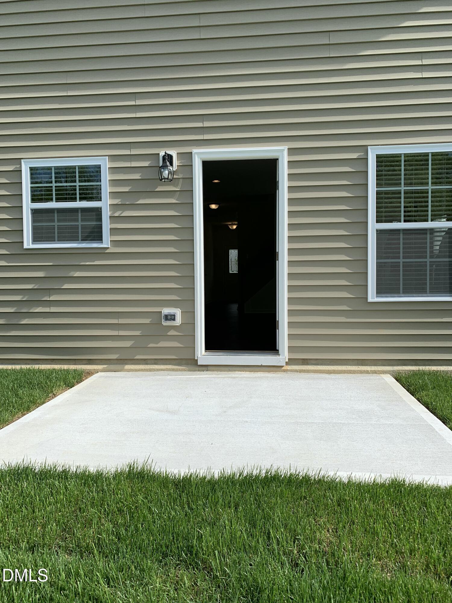 1249 Turkey Trot Road Wendell, NC 27591 - Photo 13 of 42 a front view of a house with a yard and garage