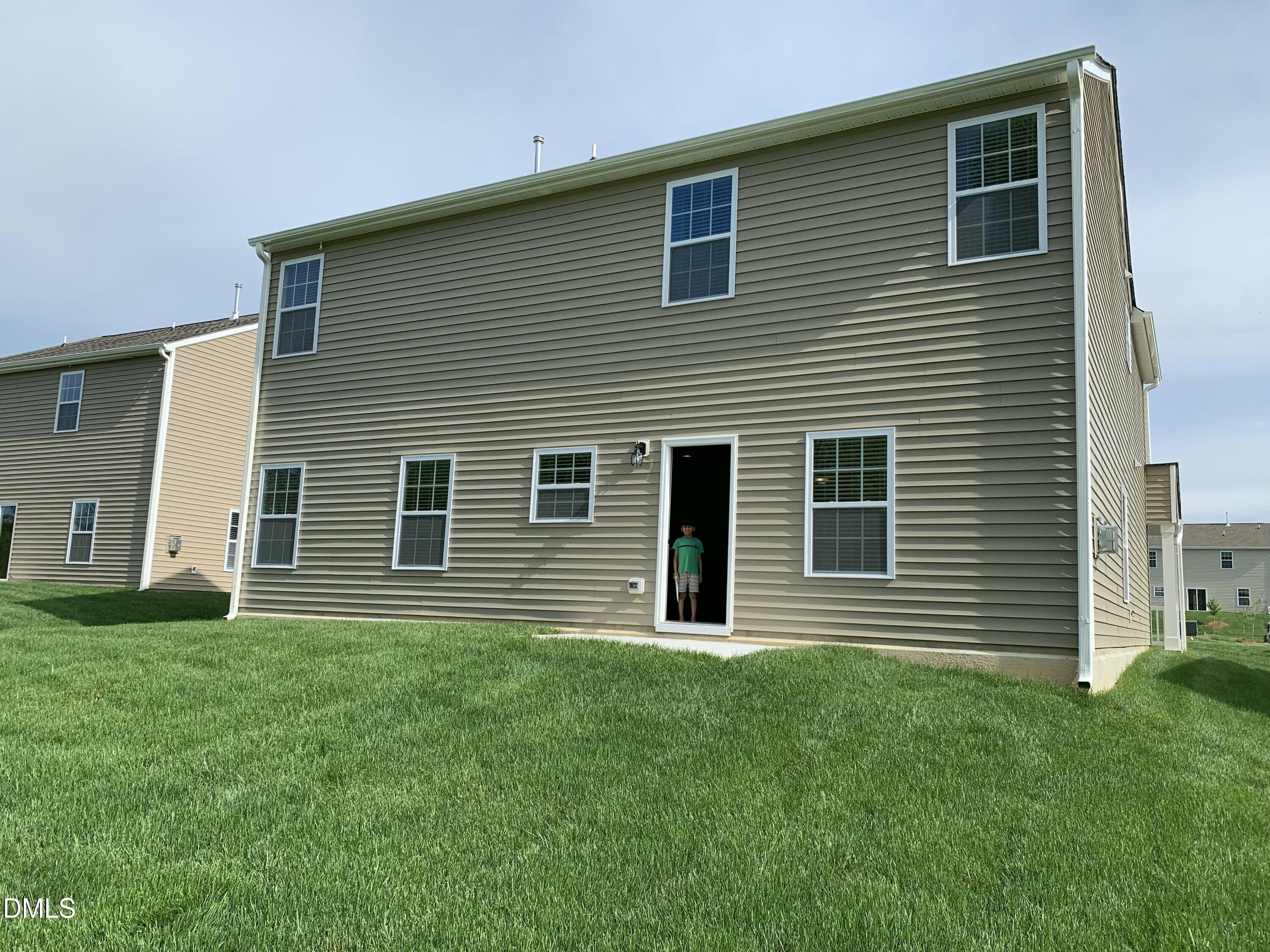 1249 Turkey Trot Road Wendell, NC 27591 - Photo 14 of 42 a front view of a house with a garden
