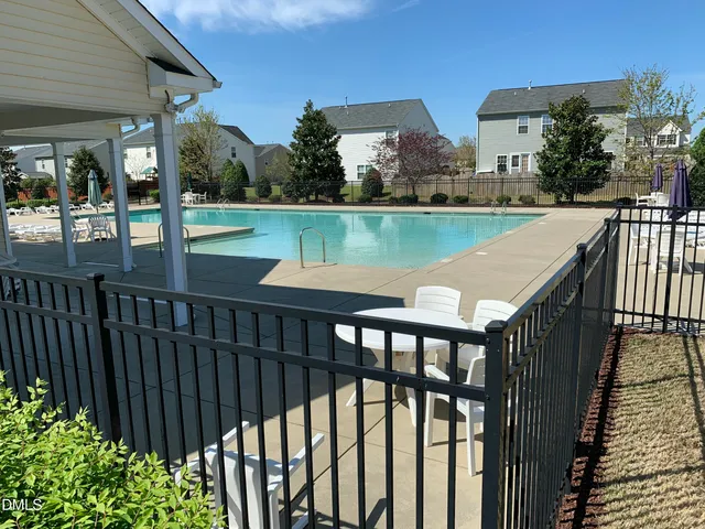 a view of a deck with a lake view
