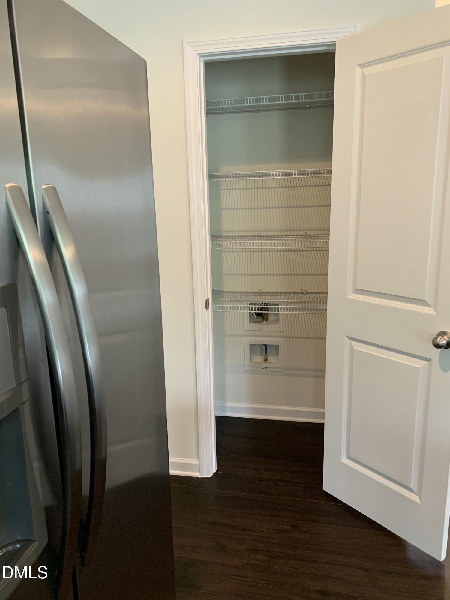 1249 Turkey Trot Road Wendell, NC 27591 - Photo 4 of 42 a view of walk in closet with wooden floor