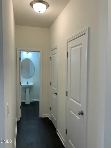 a bathroom with a sink and mirror