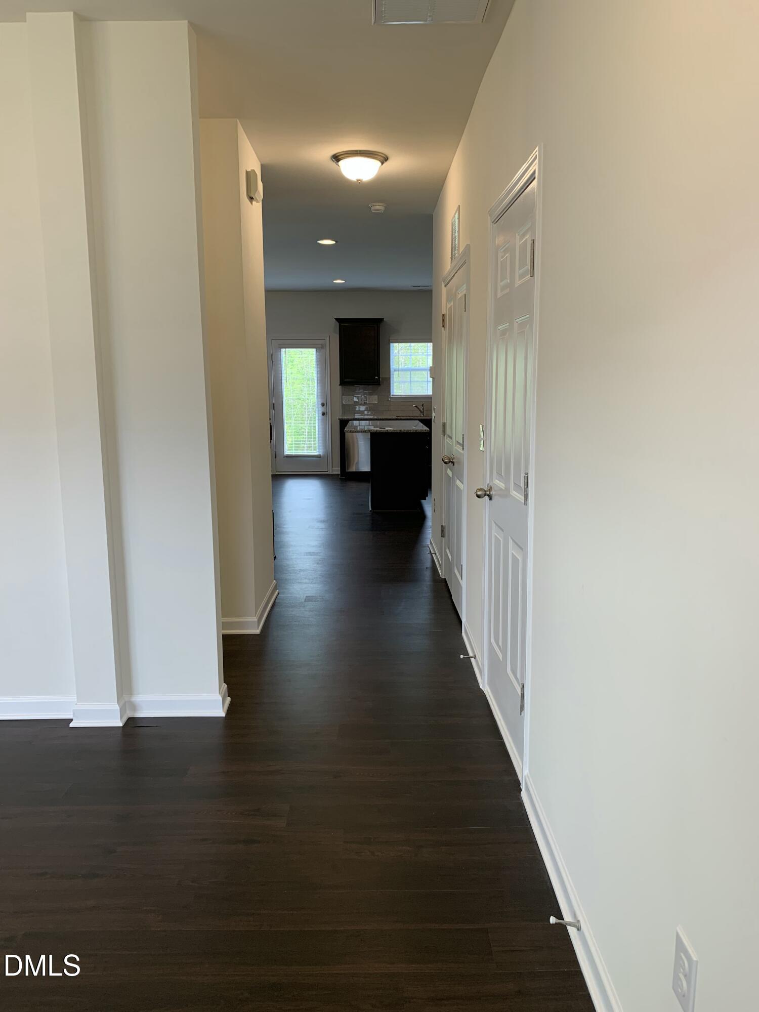 1249 Turkey Trot Road Wendell, NC 27591 - Photo 7 of 42 a view of a hallway with wooden floor