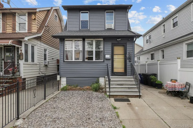 a front view of a house with a porch
