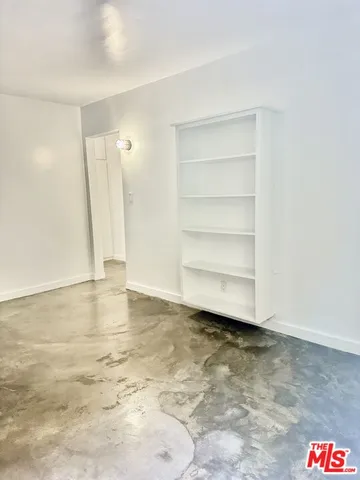 an empty room with a natural light