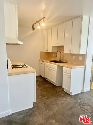 a view of a back yard of the house