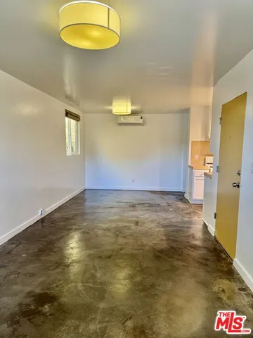 a view of a street with cars