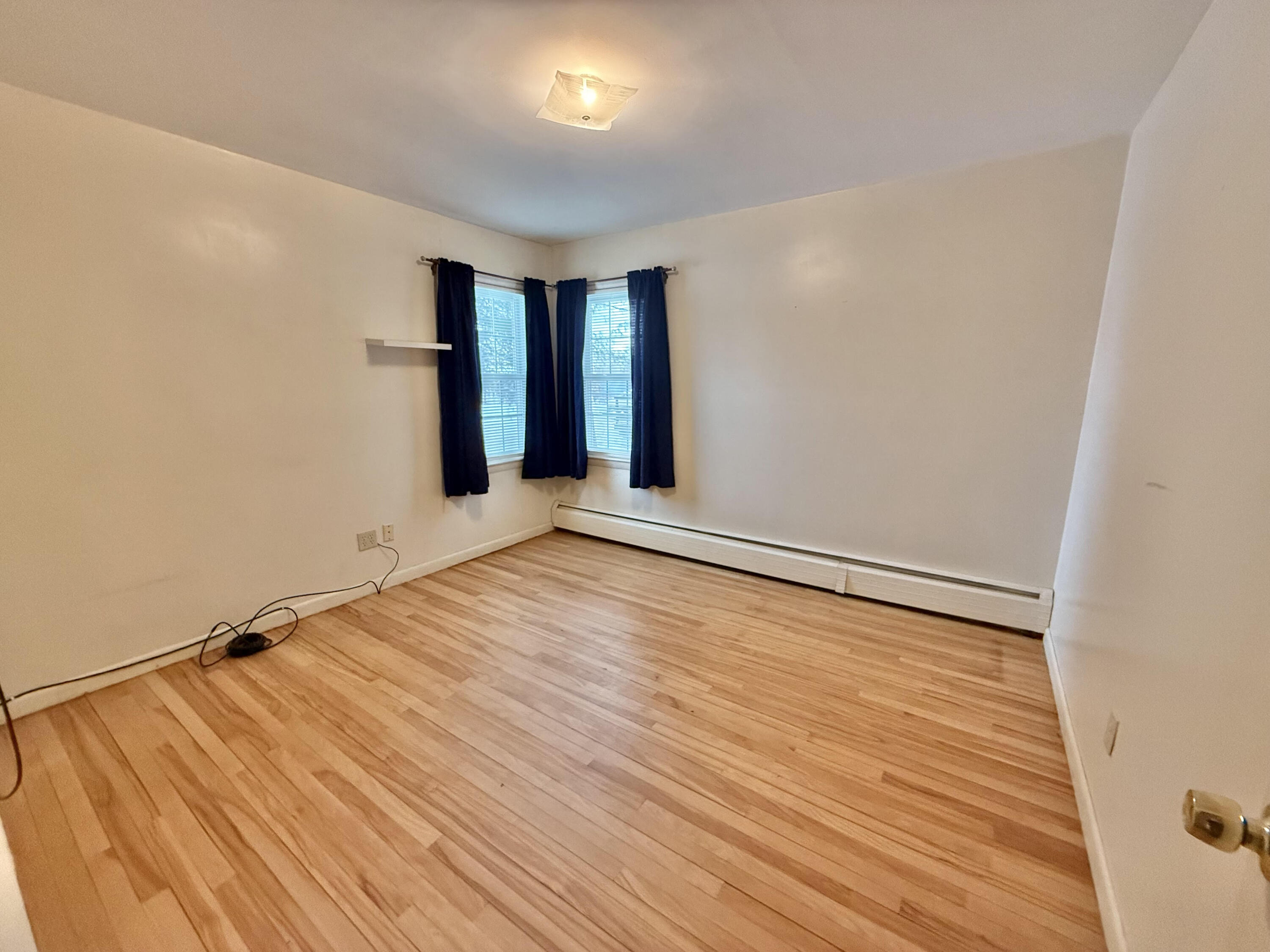 94 Hogan Road Lewiston, ME 04240 - Photo 6 of 15 1st floor bedroom