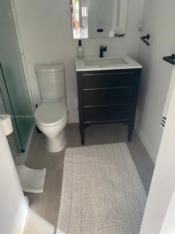 a bathroom with a sink and a toilet