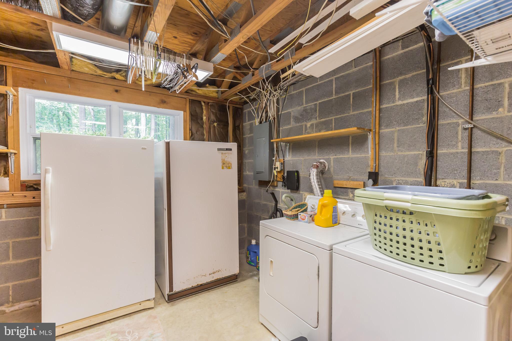 5240 Bayside Road Chesapeake Beach, MD 20732 - Photo 26 of 26 Laundry Room with extra Freezer and Refrigerator