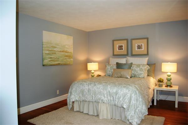 8 Scenna Road Beverly, MA 01915 - Photo 9 of 17 a bedroom with a bed and a lamp