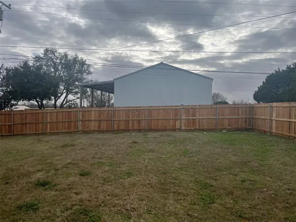 a view of backyard and space