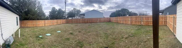 a view of backyard and space