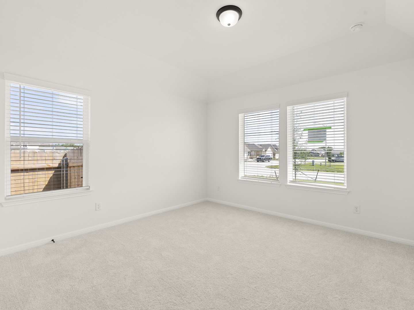 402 Judson Street Bertram, TX 78605 - Photo 4 of 27 an empty room with a window