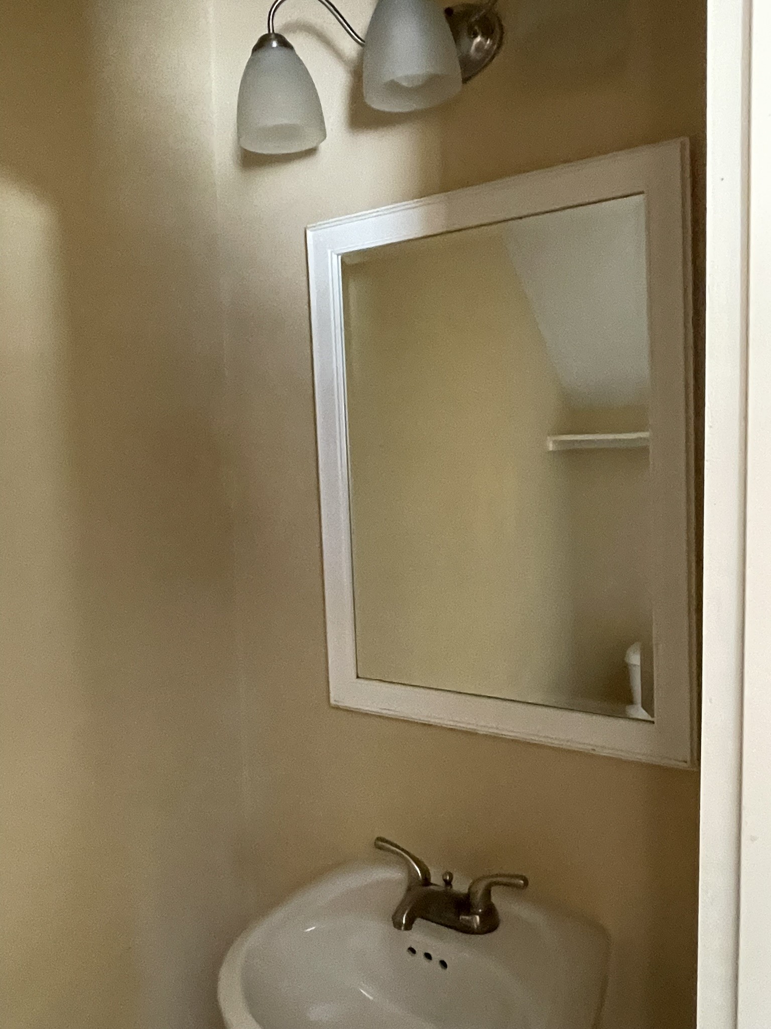 5829 Hartwick Road Houston, TX 77016 - Photo 23 of 47 a bathroom with a sink and vanity