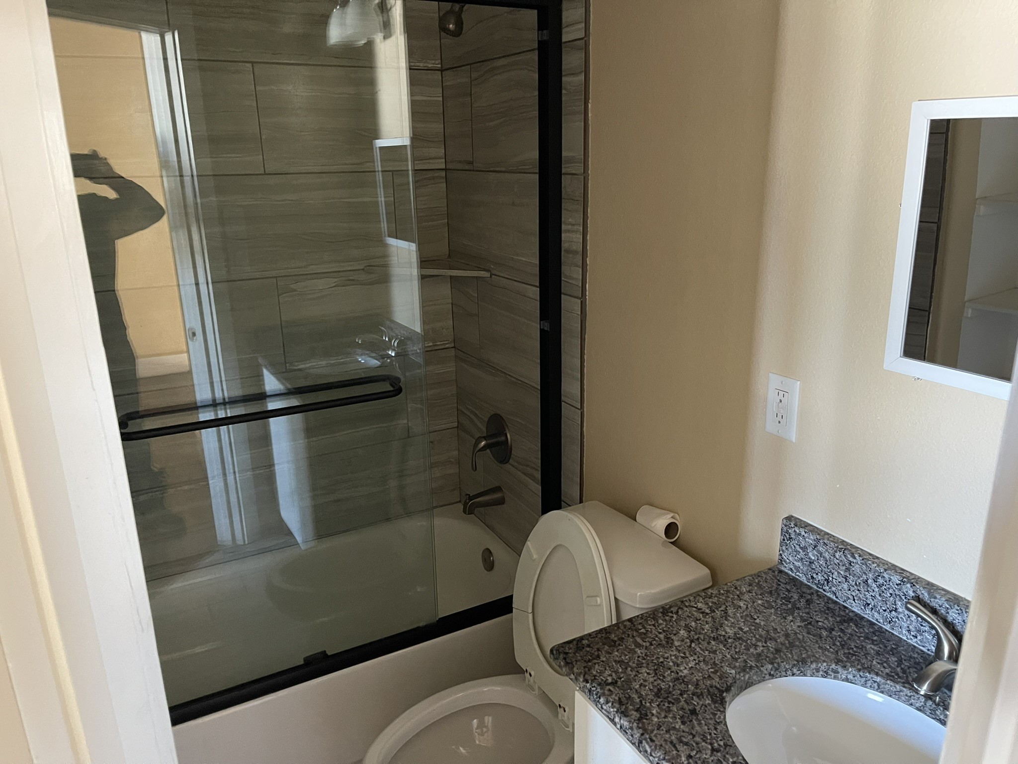 5829 Hartwick Road Houston, TX 77016 - Photo 28 of 47 a bathroom with a sink toilet and shower