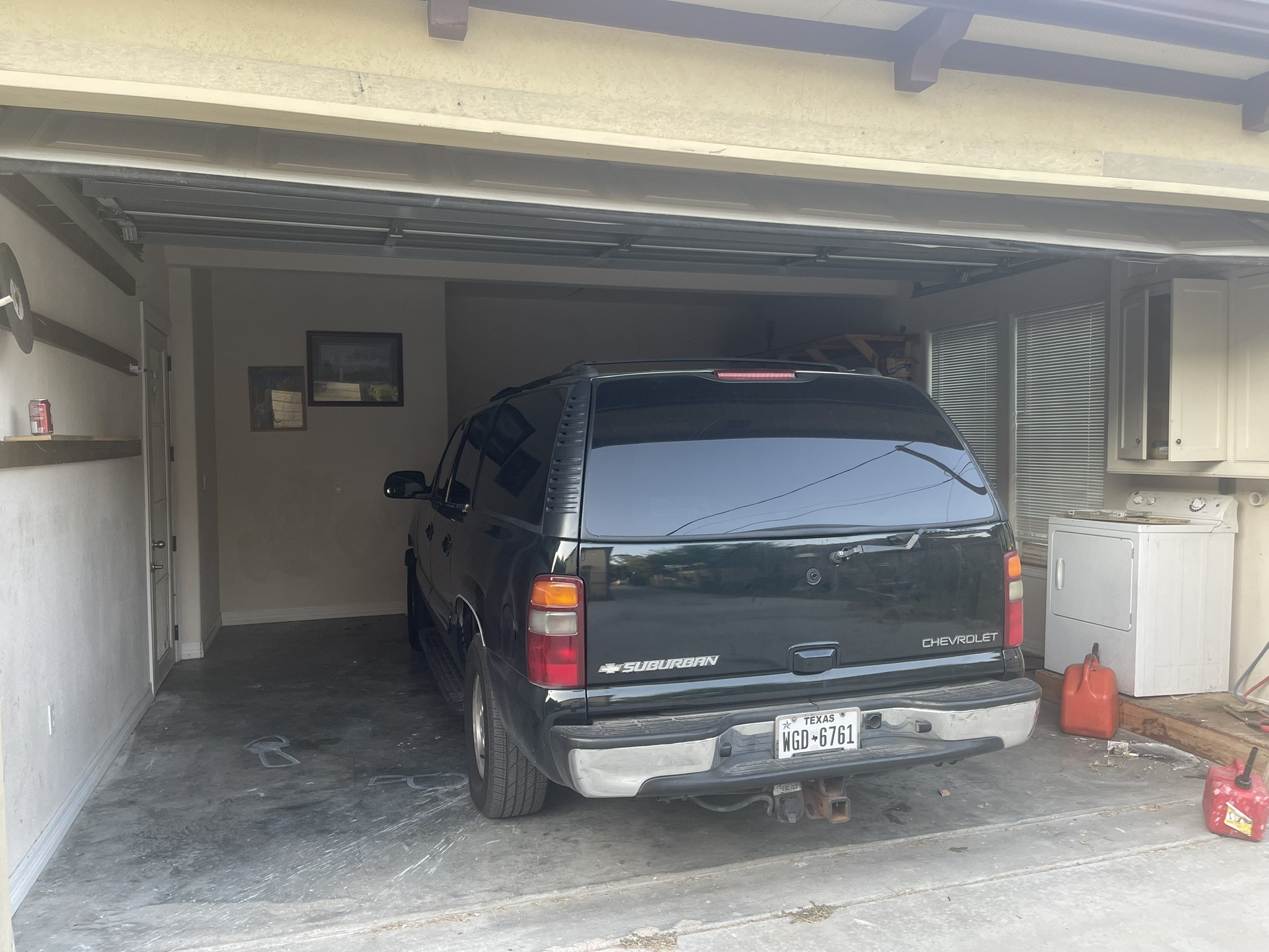 5829 Hartwick Road Houston, TX 77016 - Photo 30 of 47 a living room with a washer and dryer