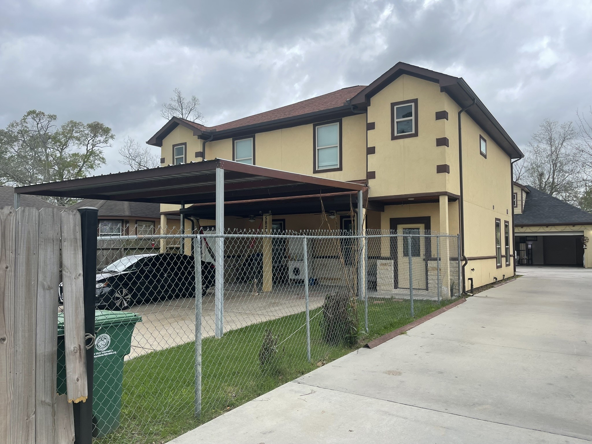 5829 Hartwick Road Houston, TX 77016 - Photo 3 of 47 a front view of a house with a yard