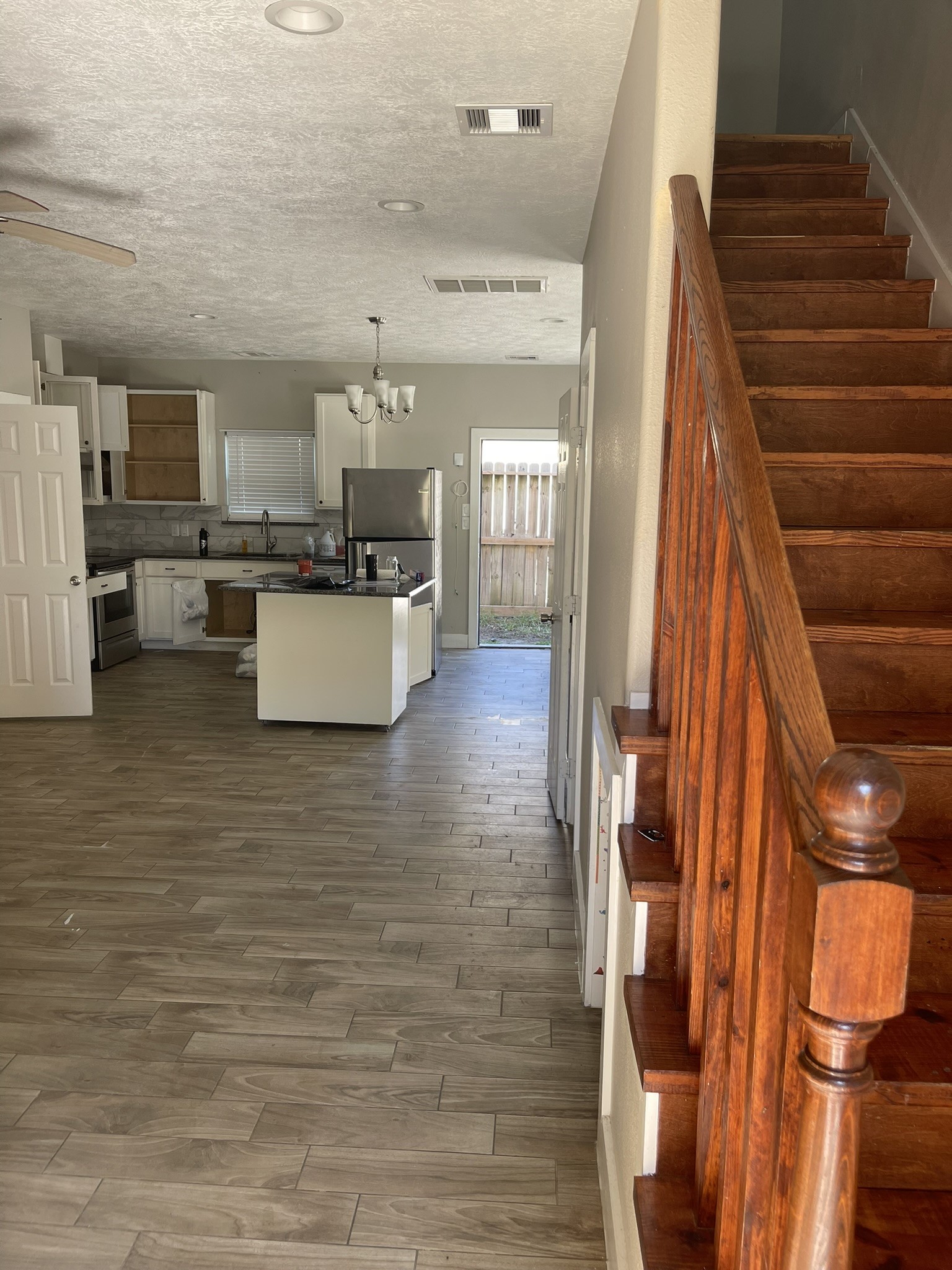 5829 Hartwick Road Houston, TX 77016 - Photo 33 of 47 a view of kitchen and kitchen with stainless steel appliances