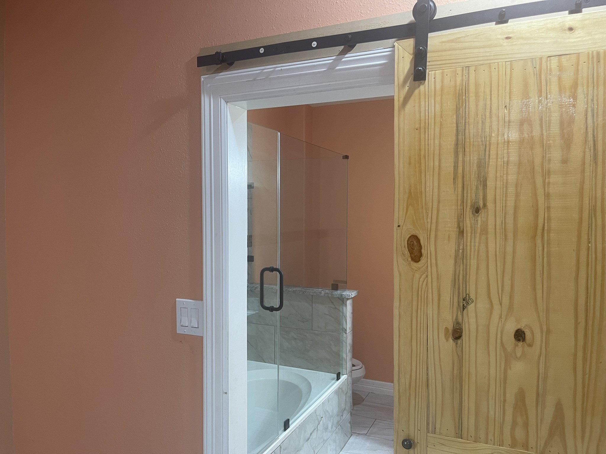 5829 Hartwick Road Houston, TX 77016 - Photo 37 of 47 a bathroom with a shower and a sink