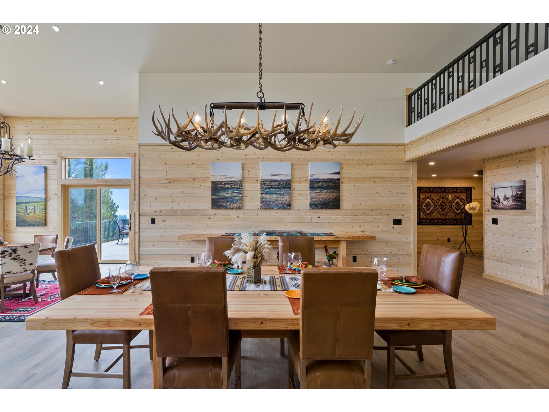 45371 Hackmore Drive Seneca, OR 97873 - Photo 11 of 37 a view of a dining room with furniture and wooden floor