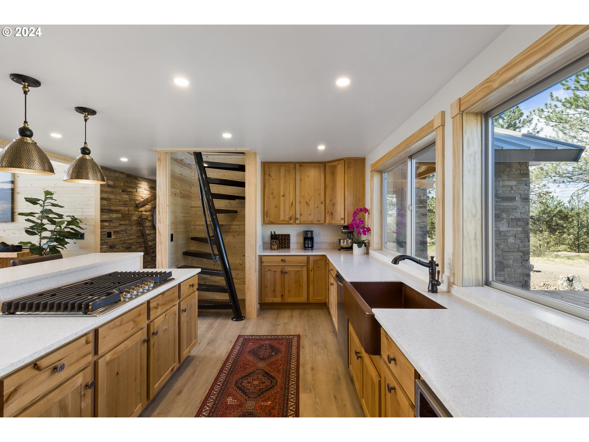 45371 Hackmore Drive Seneca, OR 97873 - Photo 14 of 37 a kitchen with sink refrigerator and large window