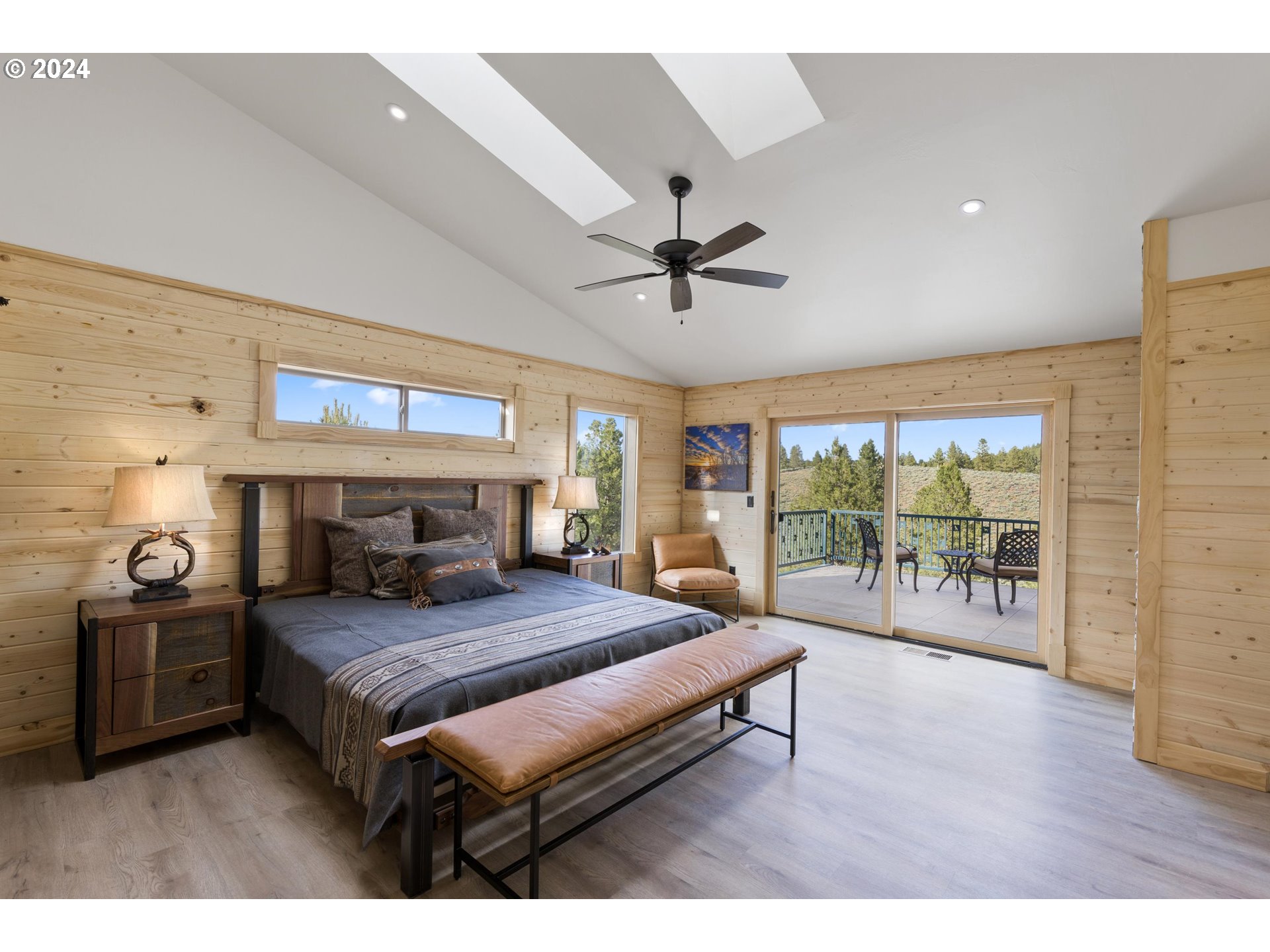 45371 Hackmore Drive Seneca, OR 97873 - Photo 16 of 37 a bedroom with a large bed and a large window