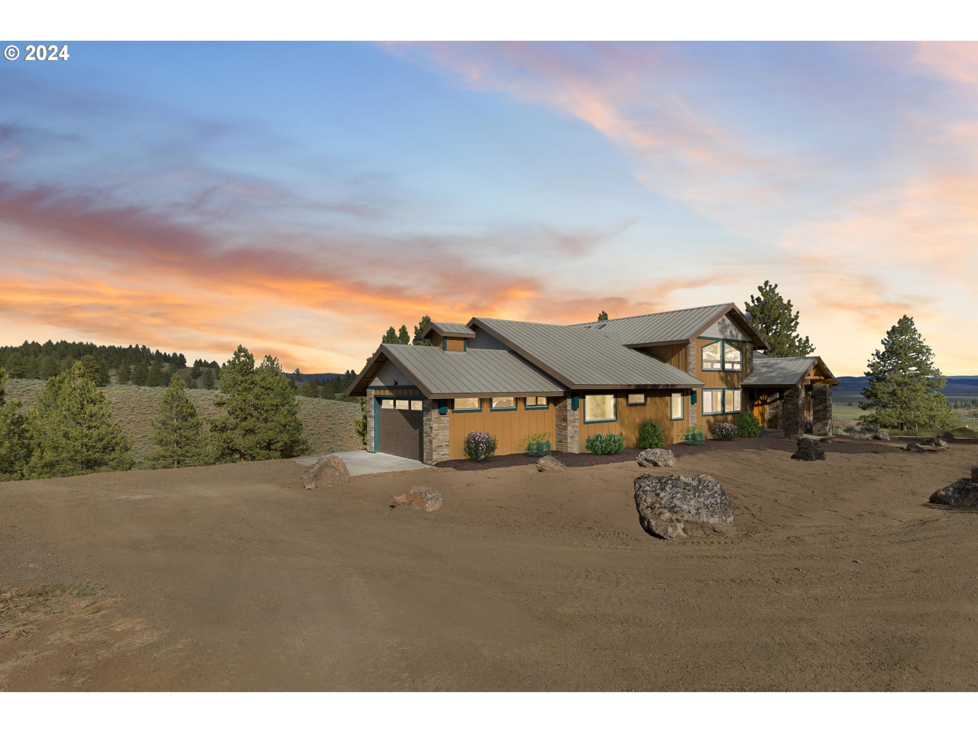 45371 Hackmore Drive Seneca, OR 97873 - Photo 29 of 37 a view of a big house with a big yard and large trees