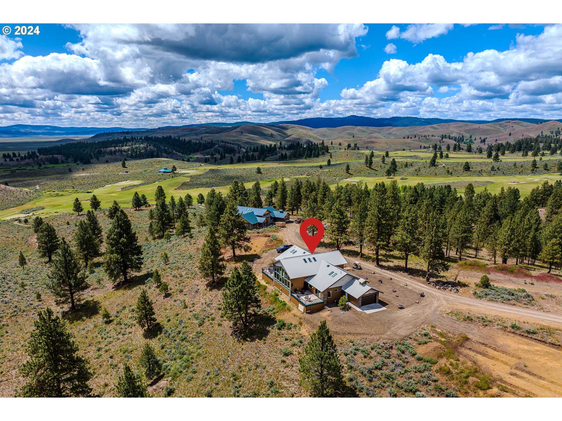 45371 Hackmore Drive Seneca, OR 97873 - Photo 31 of 37 a view of a lake with a mountain