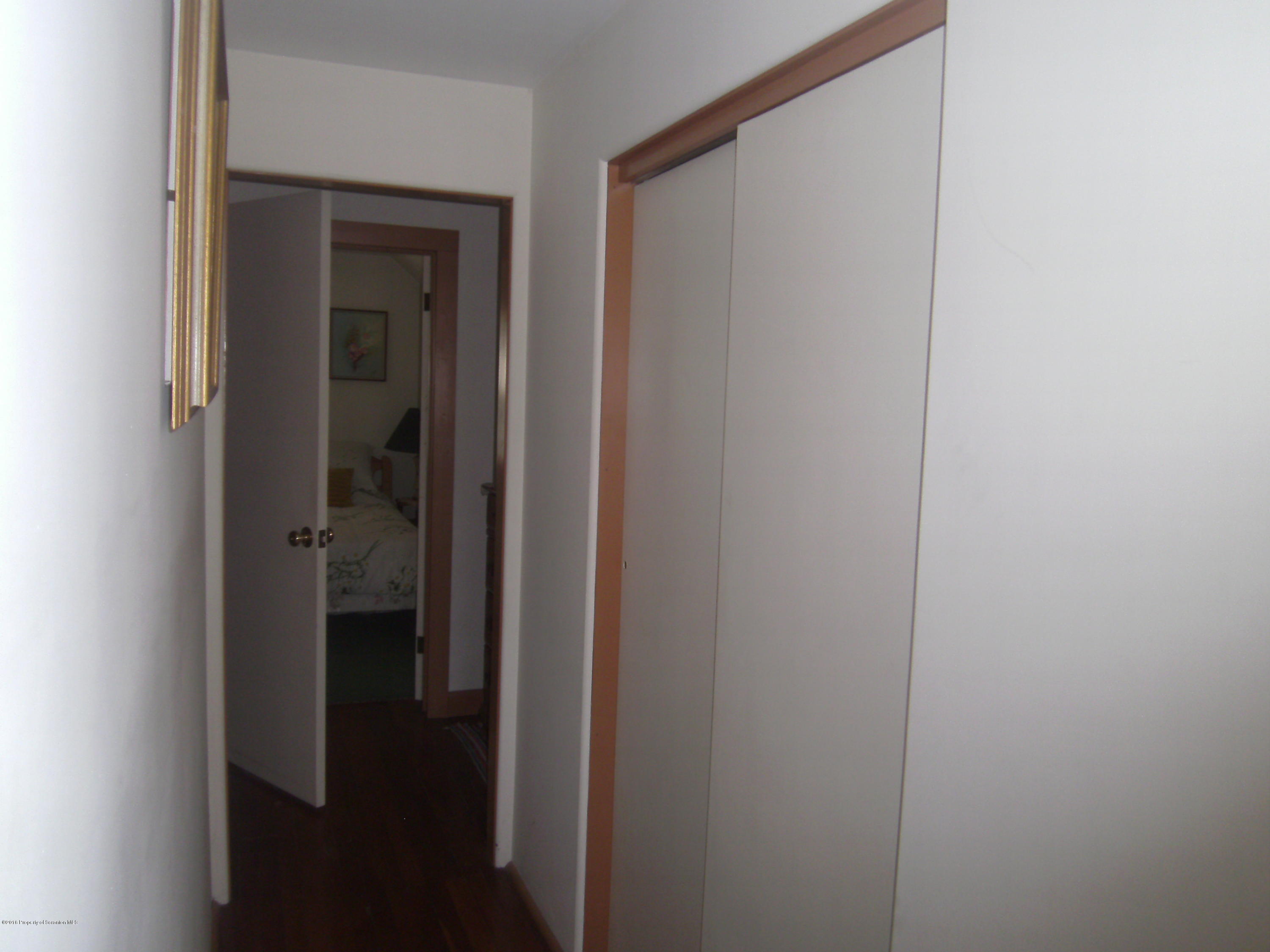 855 Becks Crossing Road Moscow, PA 18444 - Photo 16 of 43 a bathroom with a glass shower door