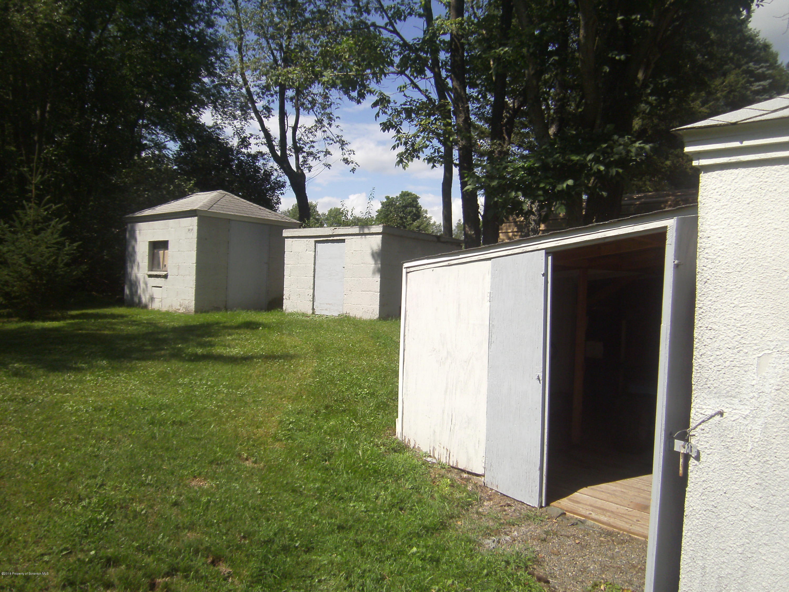 855 Becks Crossing Road Moscow, PA 18444 - Photo 29 of 43 a view of a house with a yard